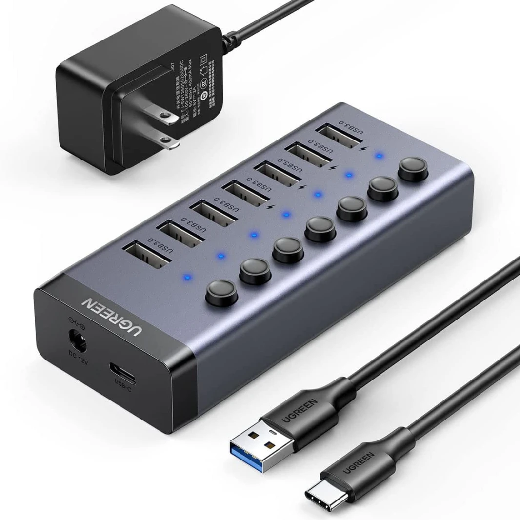 موزع USB 3.0 فردي مزود بـ 7 منافذ من UGREEN (مفتاح موزع شحن ذكي مزود بـ 4 منافذ USB)
