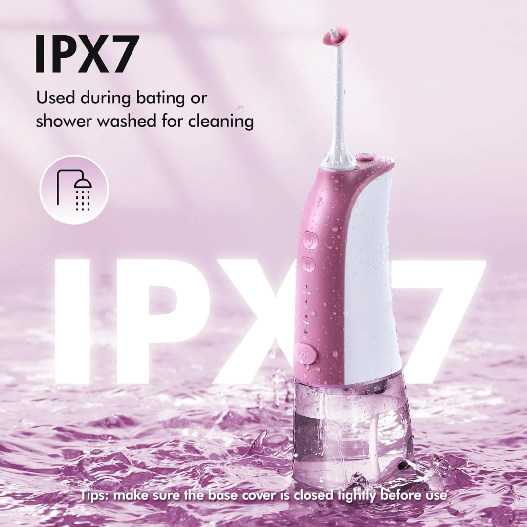جهاز تنظيف الأسنان بالماء المحمول ديميتا 3 أوضاع و5 رؤوس نفثية IPX7 مقاوم للماء - وردي
