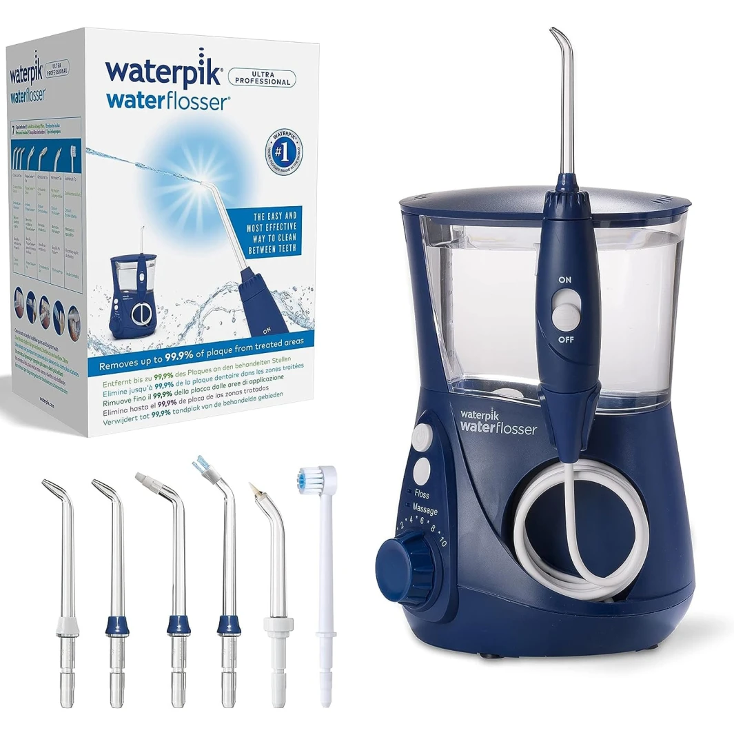 جهاز Waterpik Ultra Professional لتنظيف الأسنان بالماء مع 7 رؤوس ونظام تحكم متقدم في الضغط - أزرق